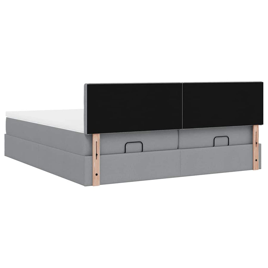 Ottoman bed met matrassen en LED's 180x200cm stof lichtgrijs