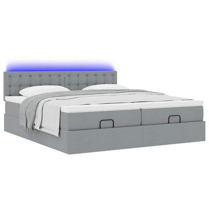 Ottoman bed met matrassen en LED's 200x200cm stof lichtgrijs
