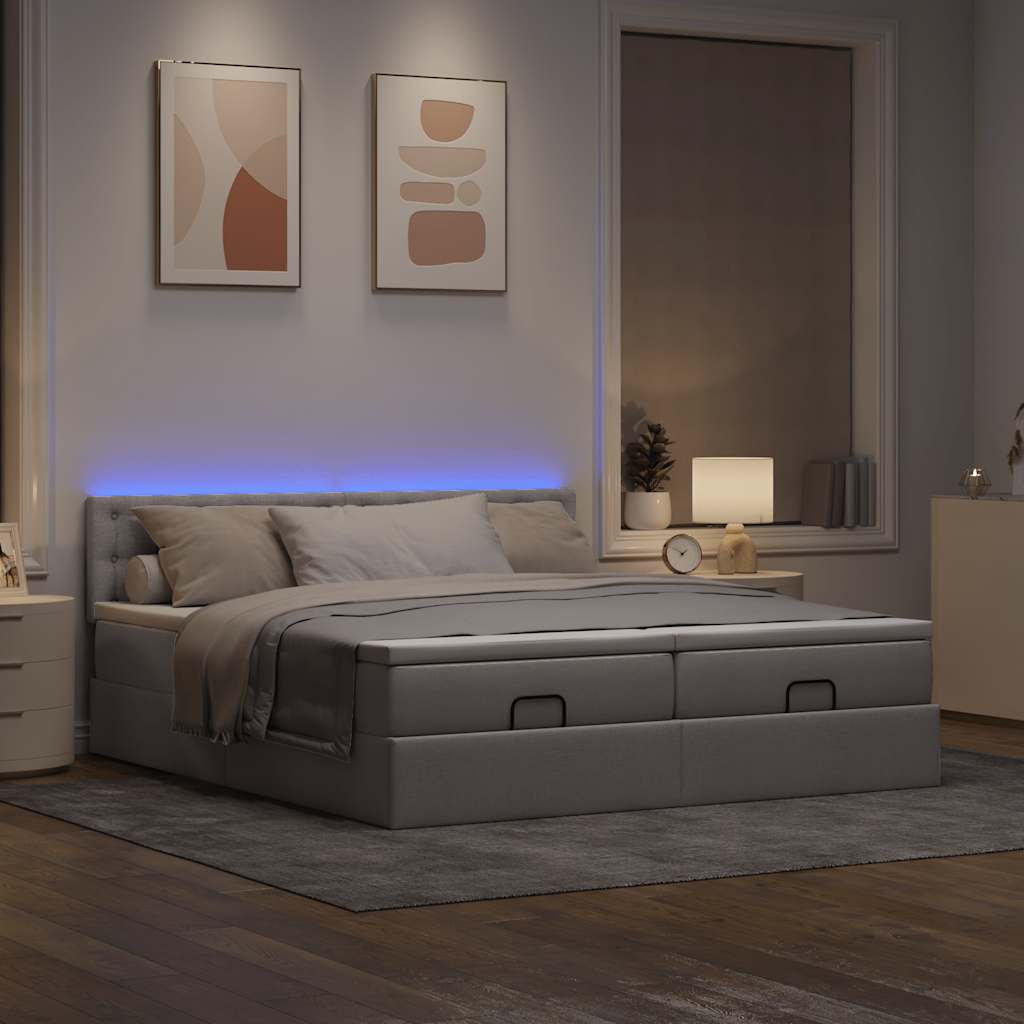 Ottoman bed met matrassen en LED's 200x200cm stof taupe