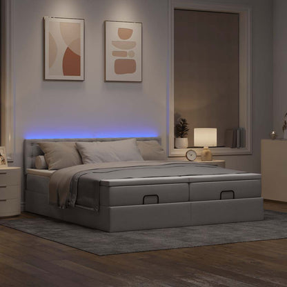 Ottoman bed met matrassen en LED's 200x200cm stof taupe