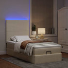 Ottoman bed with mattress and LEDs 80x200cm fabric cream