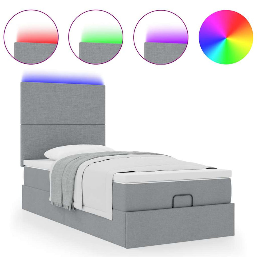 Ottoman bed met matras en LED's 90x190cm stof lichtgrijs