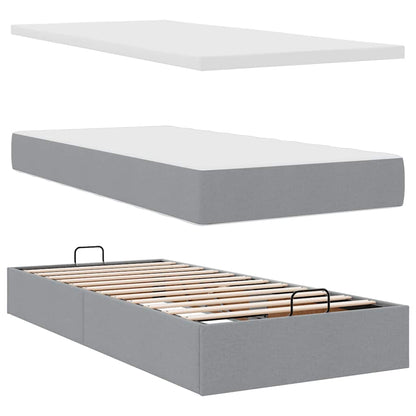 Ottoman bed met matras en LED's 90x190cm stof lichtgrijs