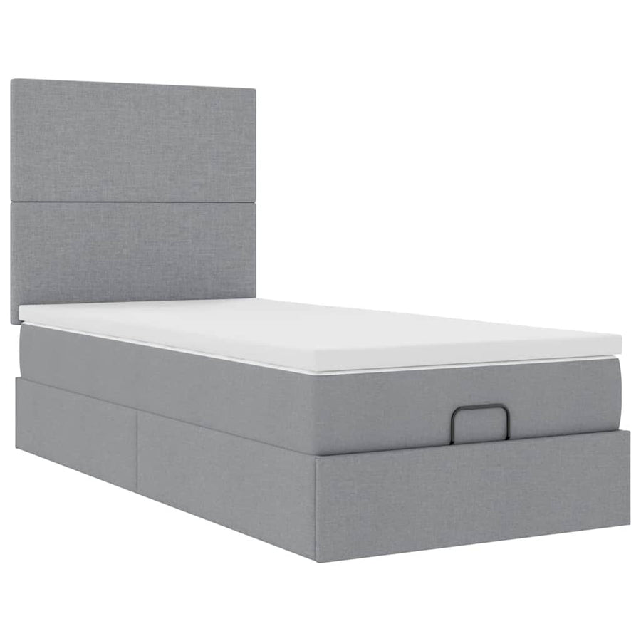 Ottoman bed met matras en LED's 90x200cm stof lichtgrijs