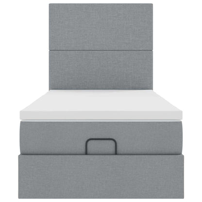 Ottoman bed met matras en LED's 90x200cm stof lichtgrijs