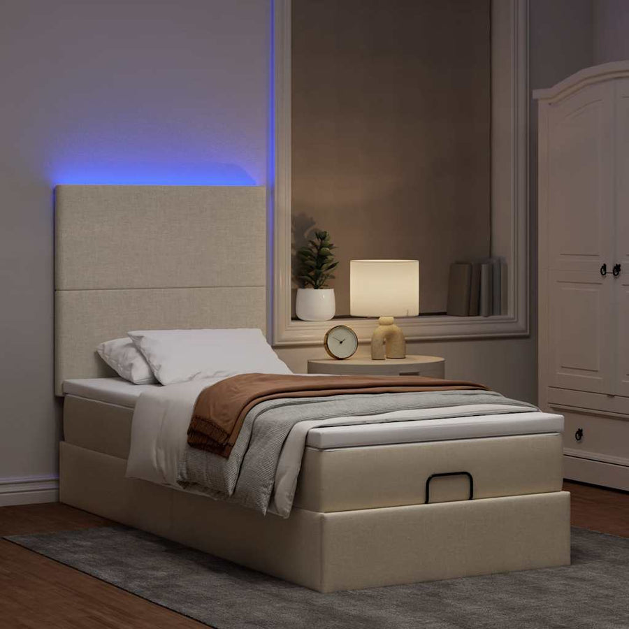 Ottoman bed met matras en LED's 90x200cm stof crèmekleurig