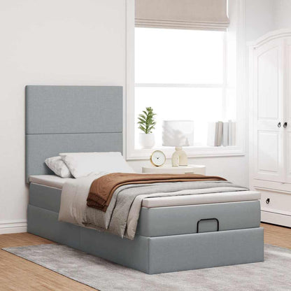 Ottoman bed met matras en LED's 100x200cm stof lichtgrijs