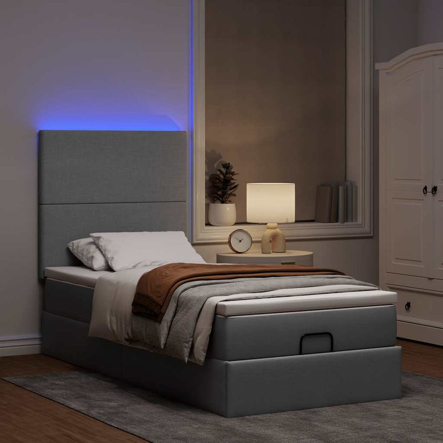 Ottoman bed met matras en LED's 100x200cm stof lichtgrijs