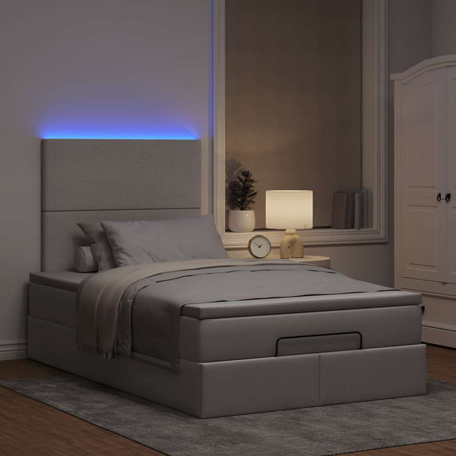 Ottoman bed met matras en LED's 120x190 cm stof taupe