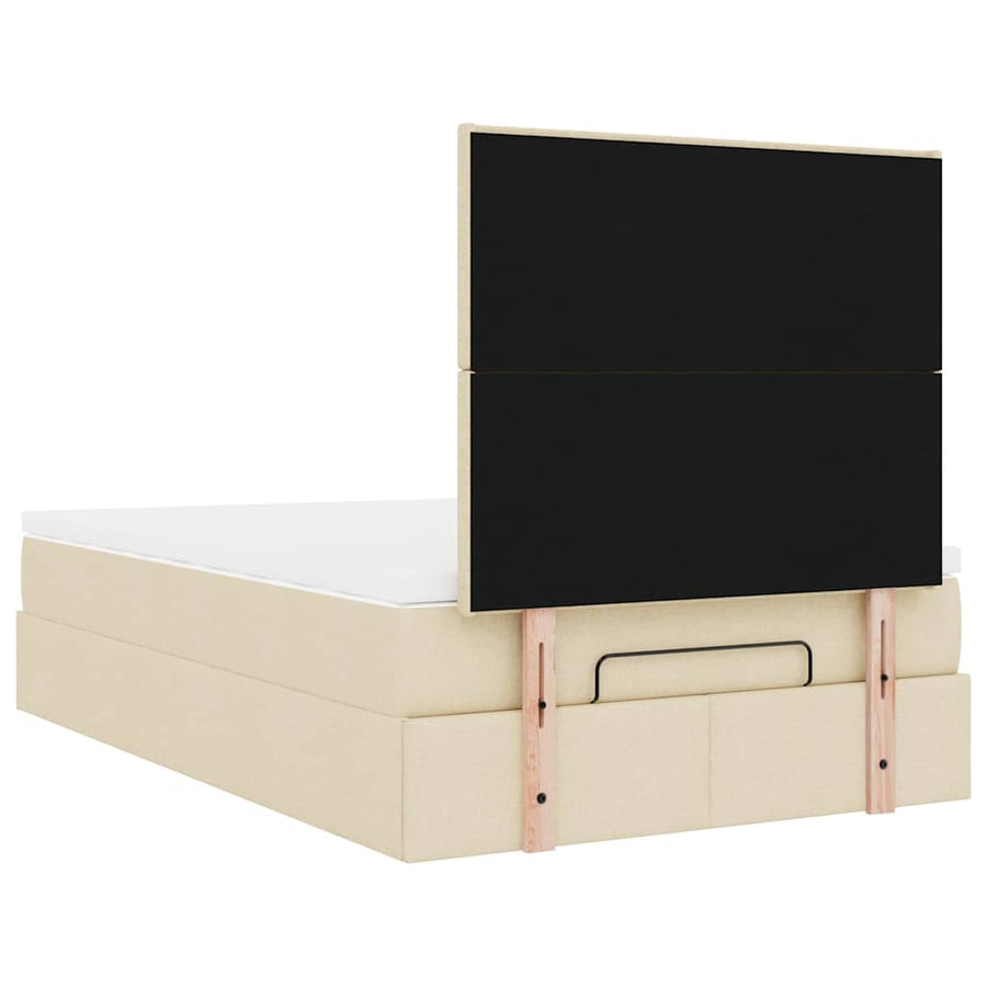 Ottoman bed met matras en LED's 120x190cm stof crèmekleurig