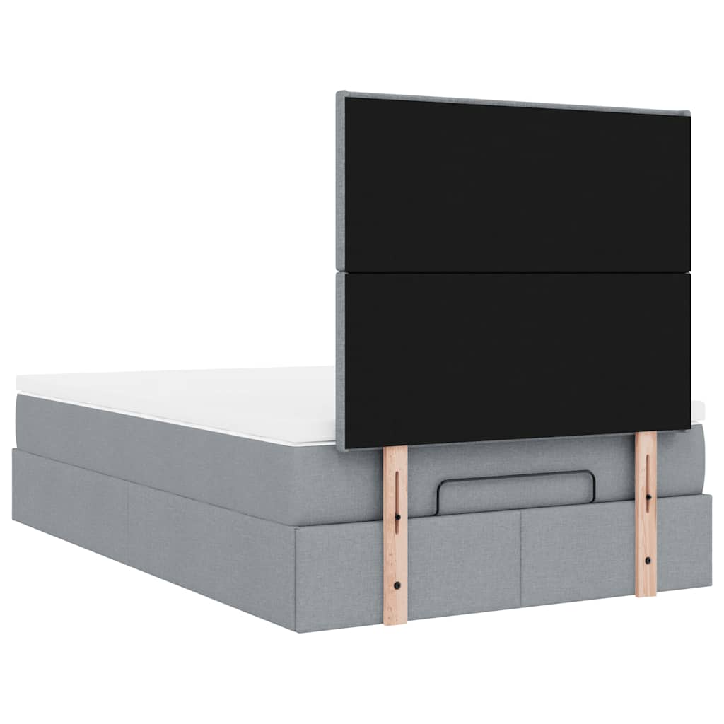 Ottoman bed met matras en LED's 120x200cm stof lichtgrijs