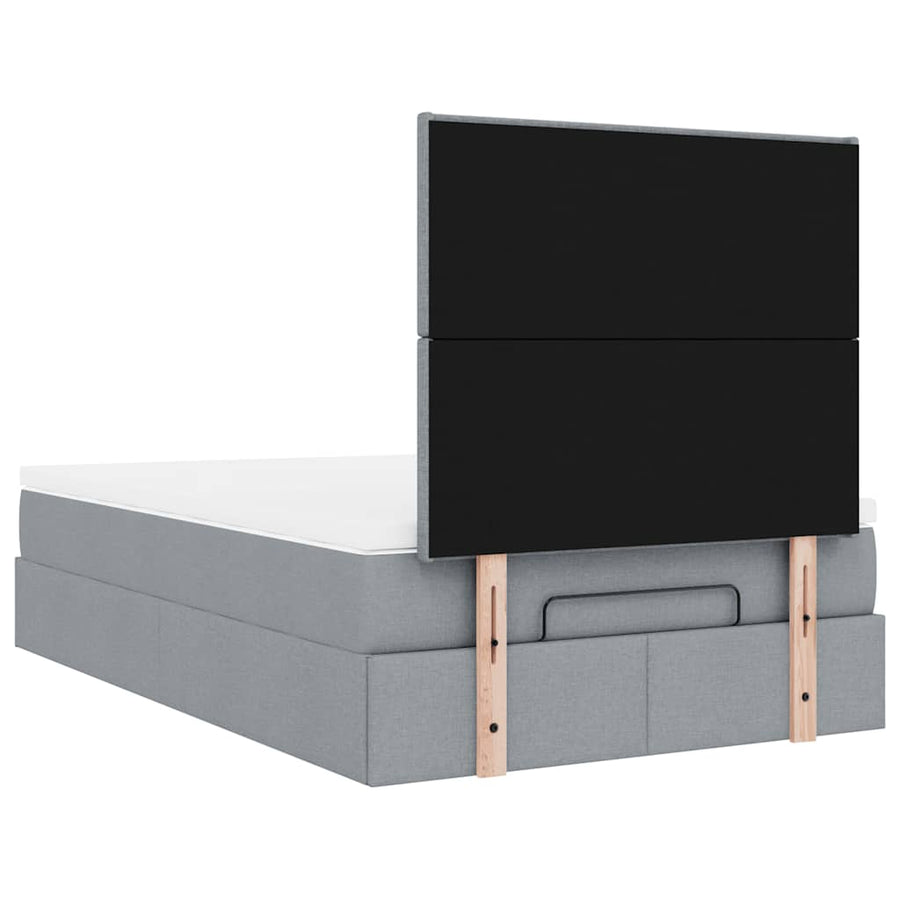 Ottoman bed met matras en LED's 120x200cm stof lichtgrijs
