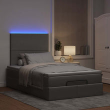 Ottoman bed met matras en LED's 120x200cm stof lichtgrijs