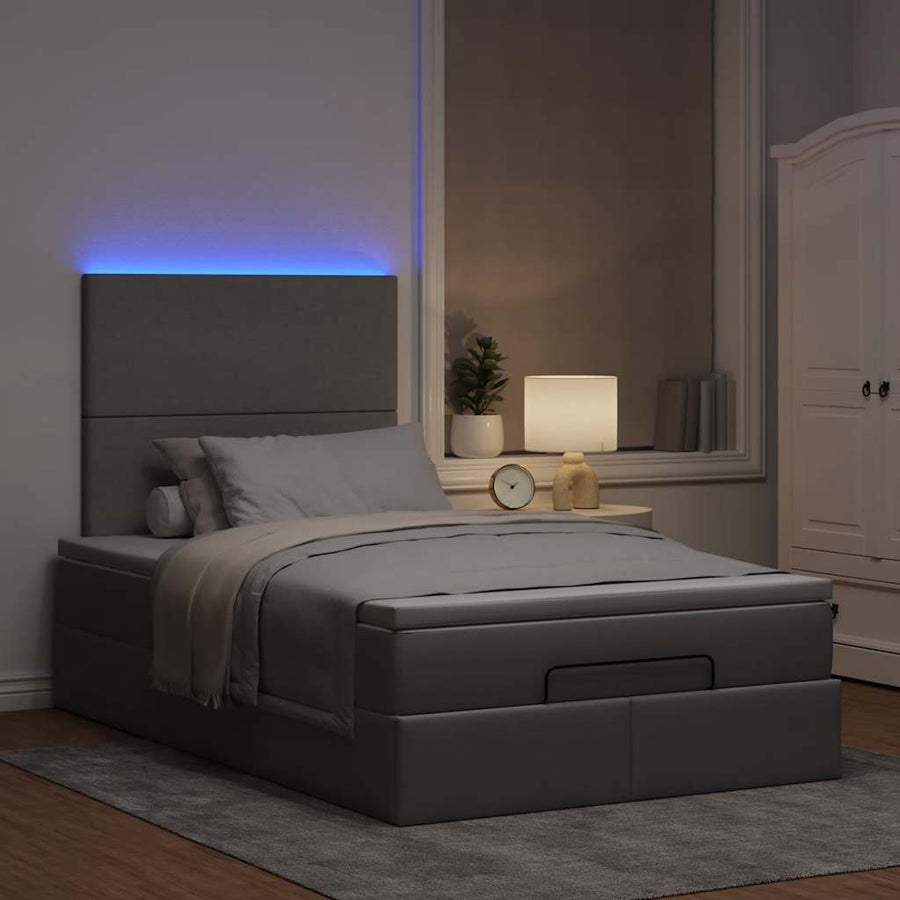 Ottoman bed met matras en LED's 120x200cm stof lichtgrijs