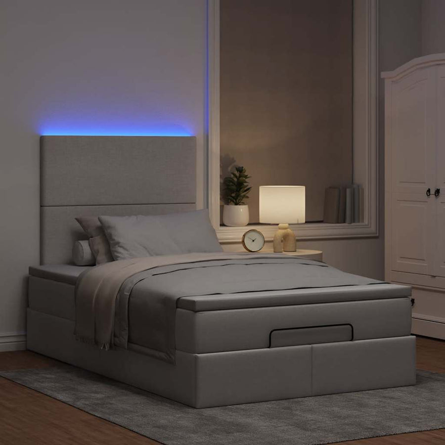 Ottoman bed met matras en LED's 120x200cm stof taupe