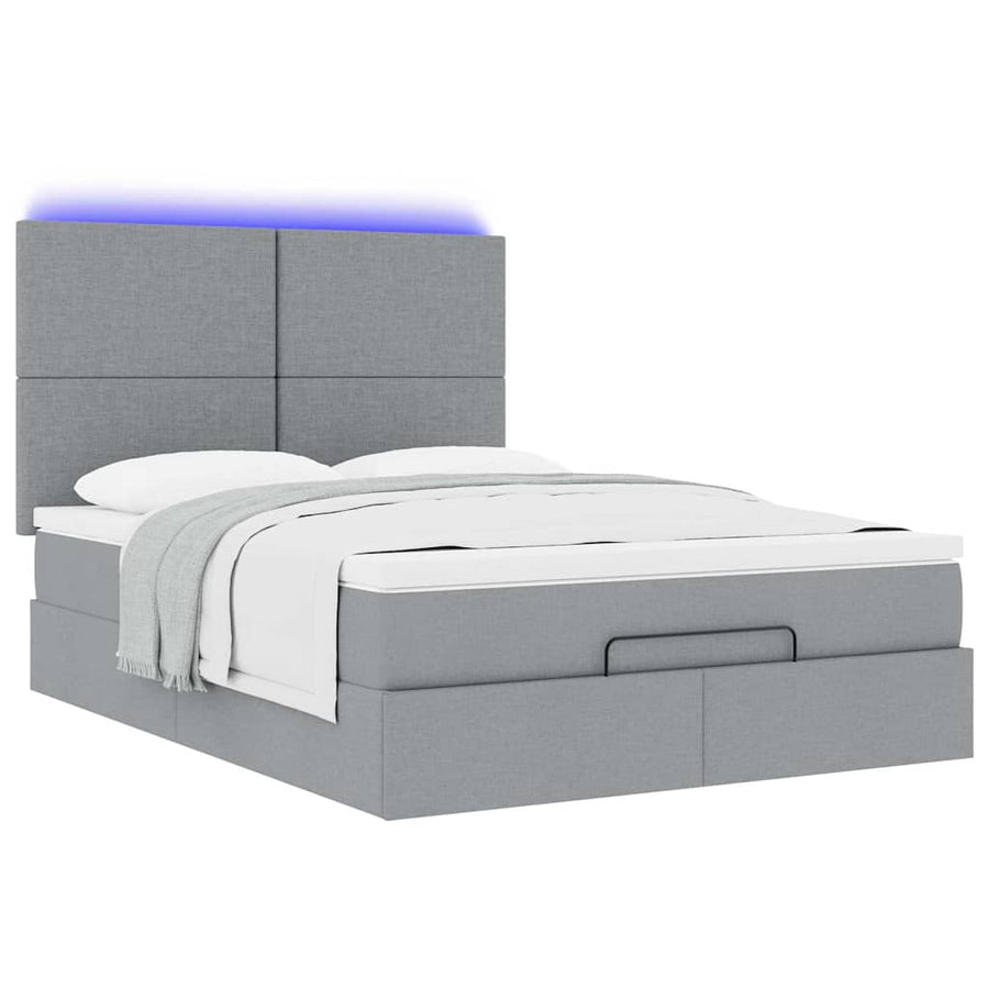 Ottoman bed met matras en LED's 140x190cm stof lichtgrijs
