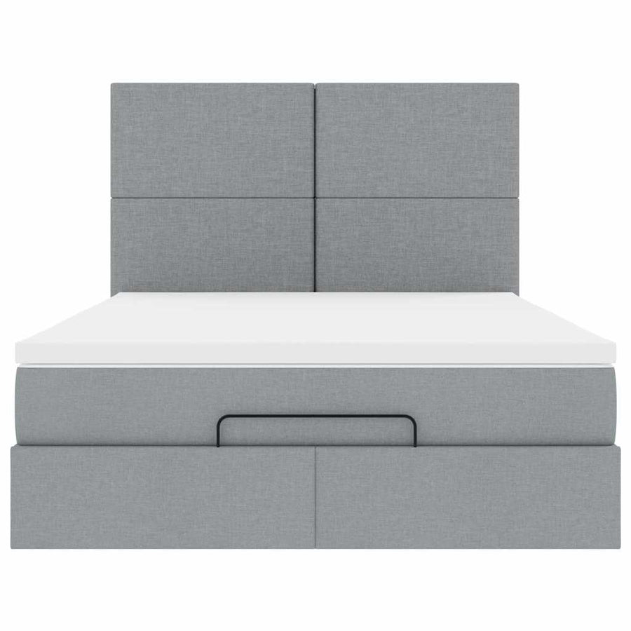 Ottoman bed met matras en LED's 140x190cm stof lichtgrijs