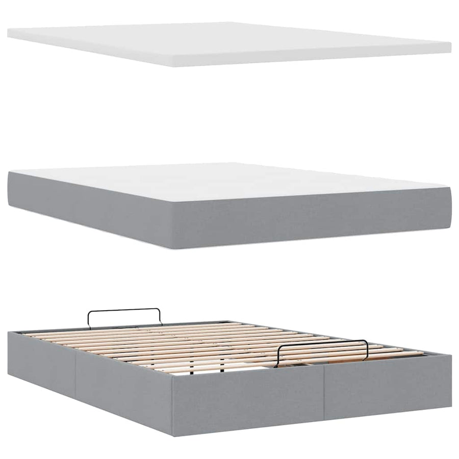 Ottoman bed met matras en LED's 140x190cm stof lichtgrijs