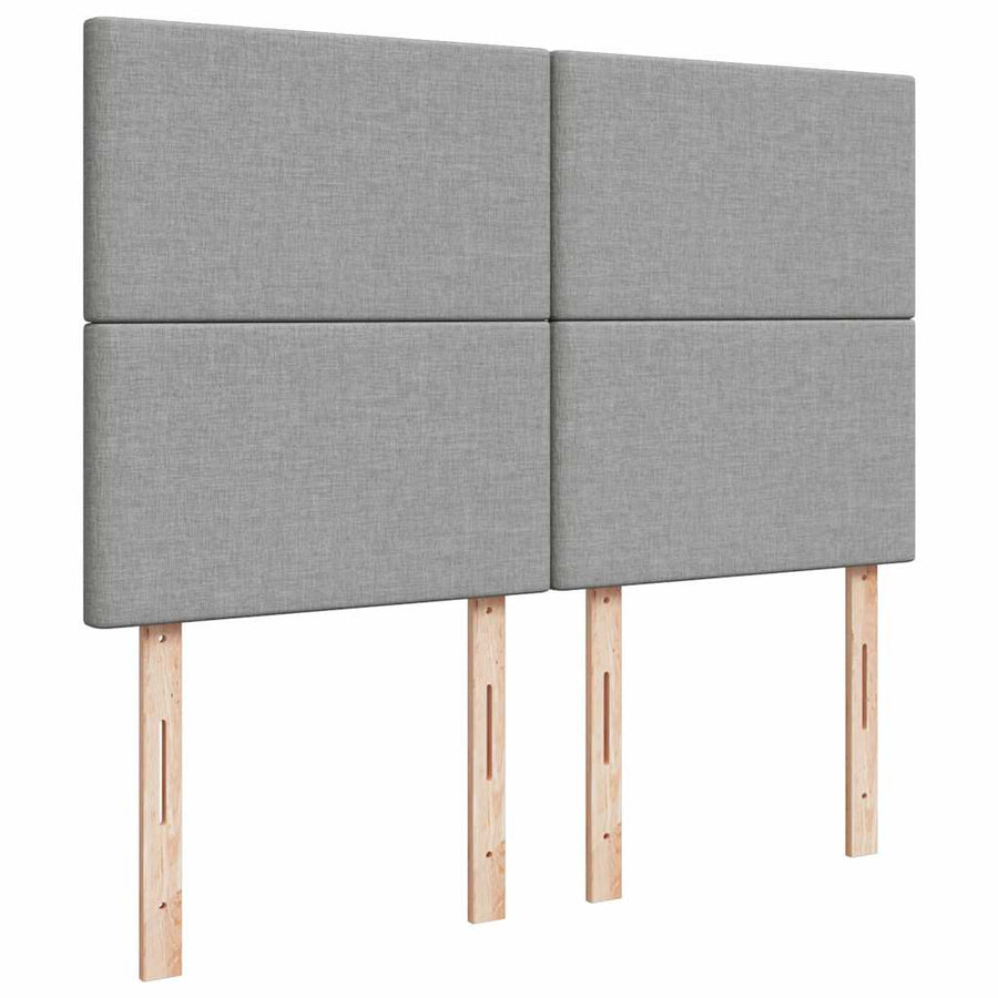 Ottoman bed met matras en LED's 140x190cm stof lichtgrijs