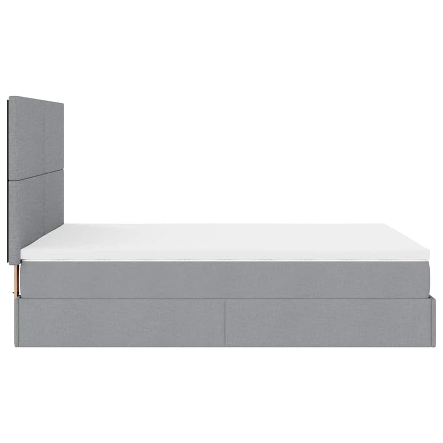 Ottoman bed met matras en LED's 140x190cm stof lichtgrijs