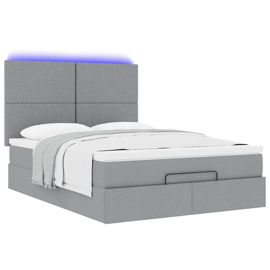 Ottoman bed met matras en LED's 140x200cm stof lichtgrijs