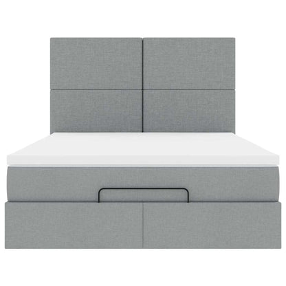 Ottoman bed met matras en LED's 140x200cm stof lichtgrijs