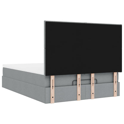 Ottoman bed met matras en LED's 140x200cm stof lichtgrijs