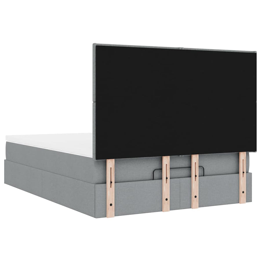 Ottoman bed met matras en LED's 140x200cm stof lichtgrijs