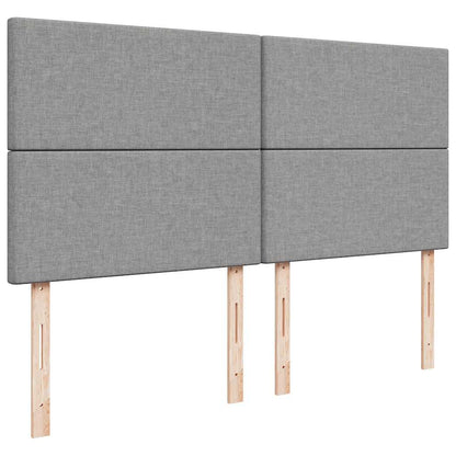 Ottoman bed met matras en LED's 180x200cm stof lichtgrijs