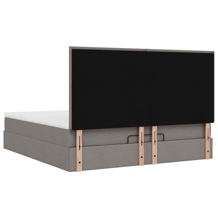 Ottoman bed met matras en LED's 180x200cm stof taupe