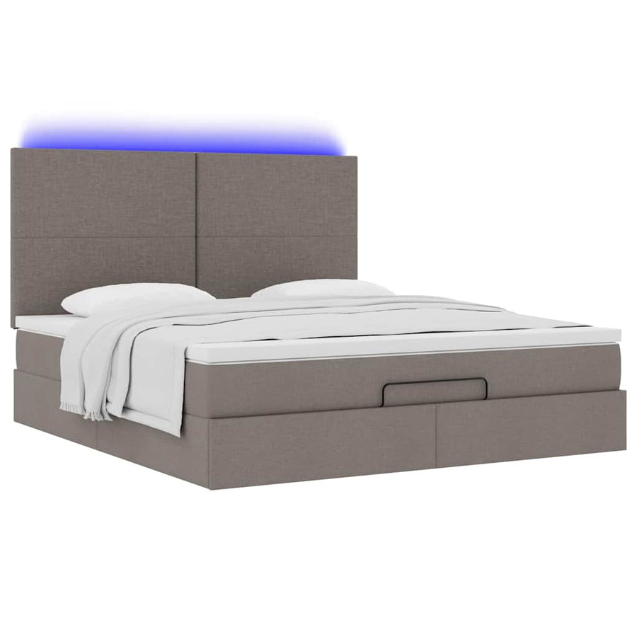 Ottoman bed met matras en LED's 180x200cm stof taupe