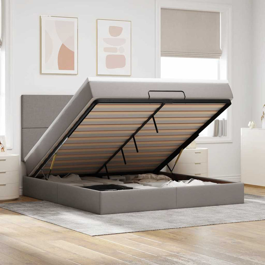 Ottoman bed met matras en LED's 180x200cm stof taupe