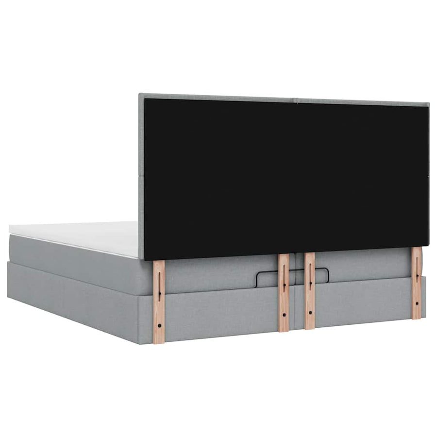 Ottoman bed met matrassen en LED's 200x200cm stof lichtgrijs