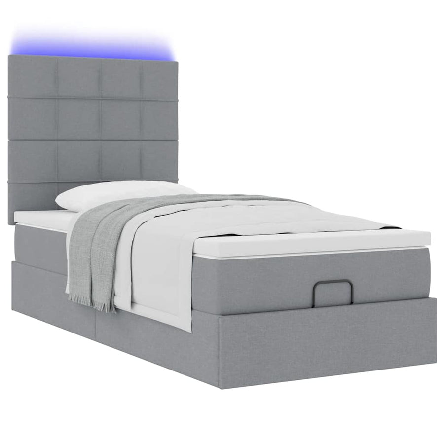 Ottoman bed met matras en LED's 80x200cm stof lichtgrijs
