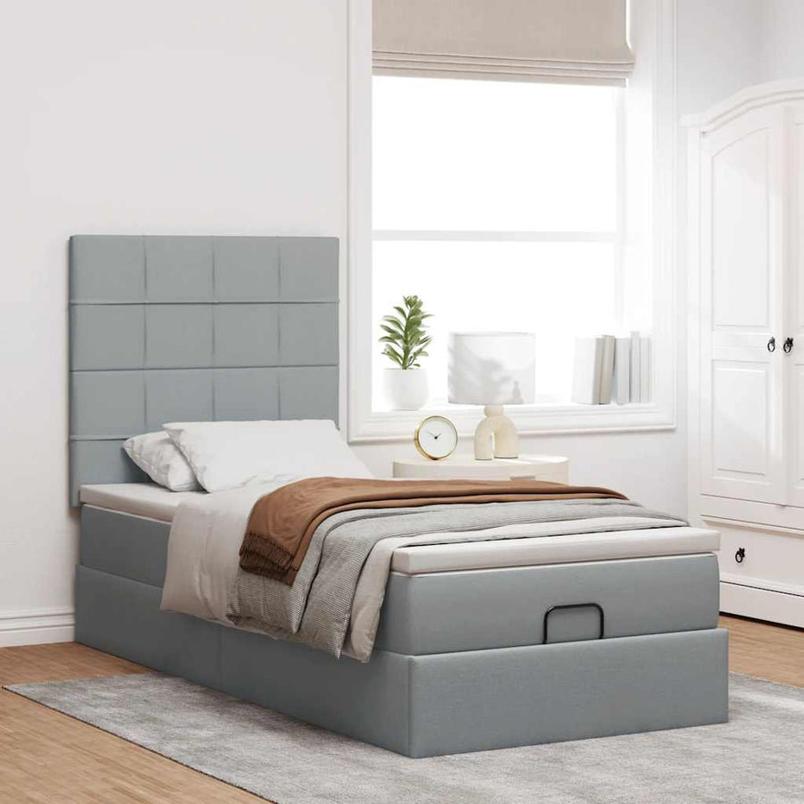 Ottoman bed met matras en LED's 80x200cm stof lichtgrijs