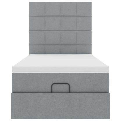 Ottoman bed met matras en LED's 80x200cm stof lichtgrijs