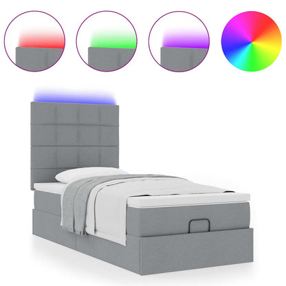 Ottoman bed met matras en LED's 90x190cm stof lichtgrijs