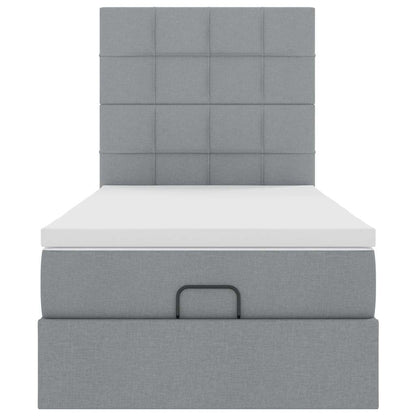 Ottoman bed met matras en LED's 90x190cm stof lichtgrijs