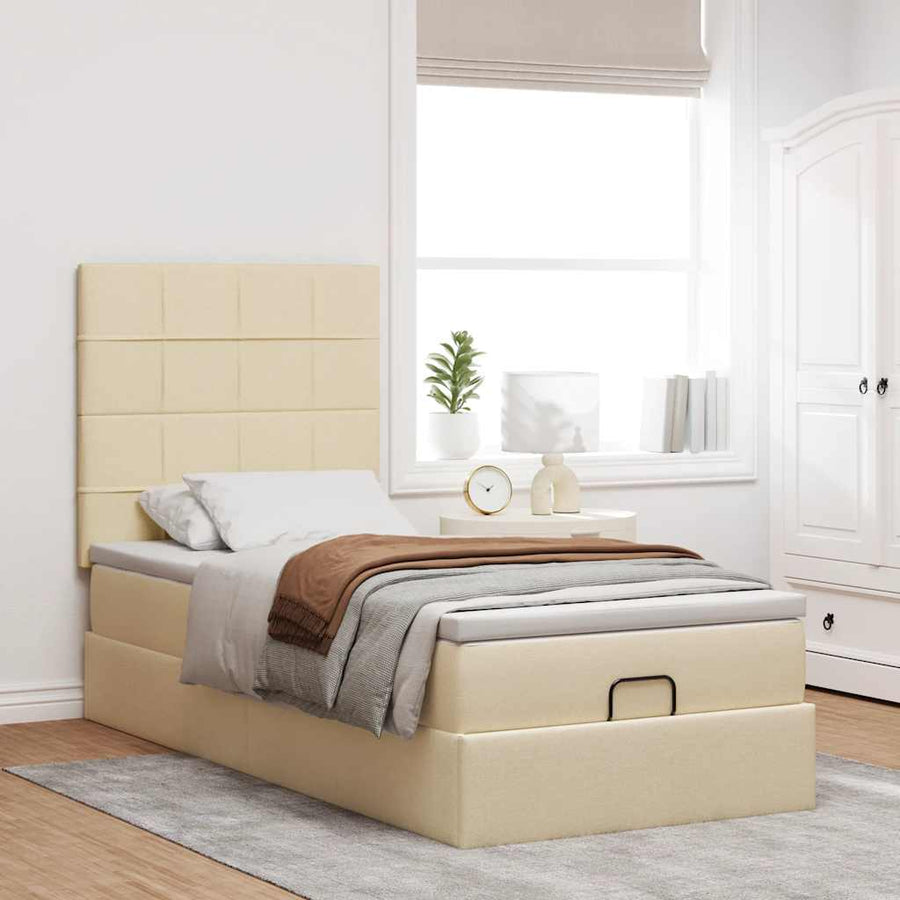 Ottoman bed met matras en LED's 90x190cm stof crèmekleurig