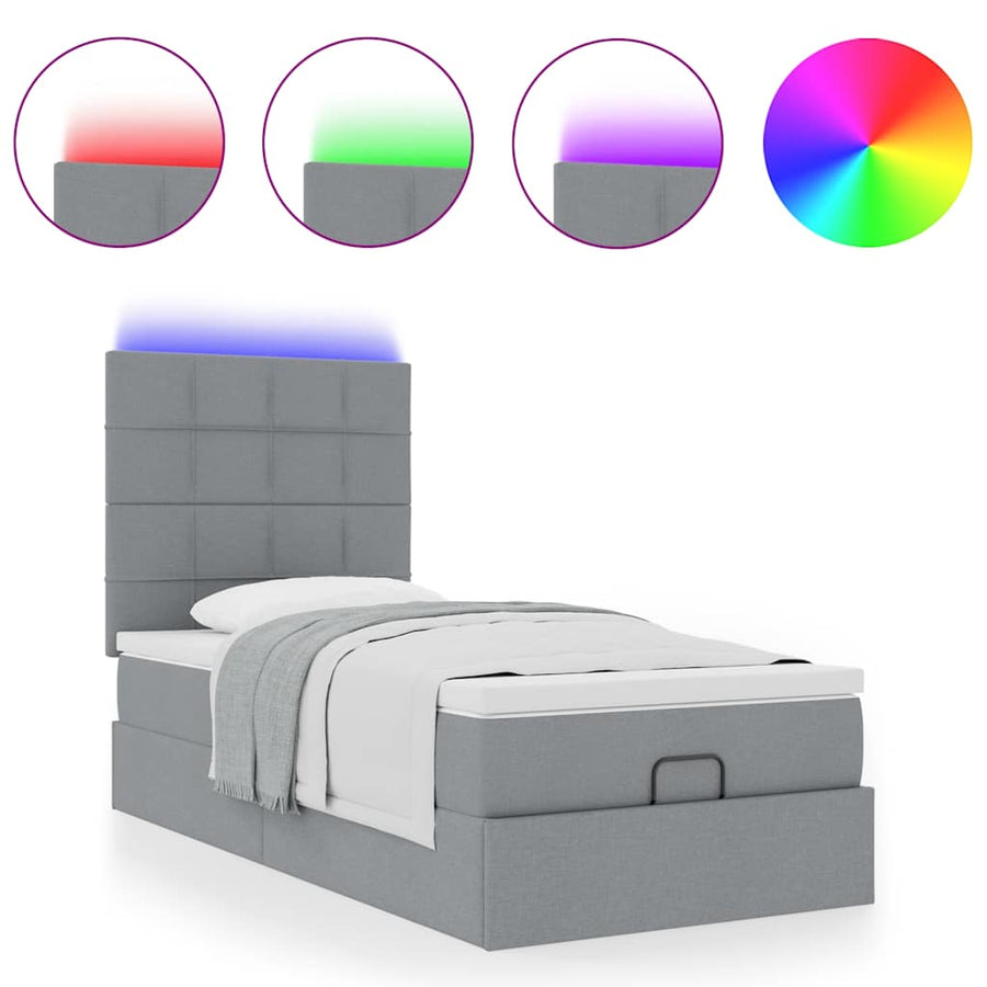 Ottoman bed met matras en LED's 90x200cm stof lichtgrijs