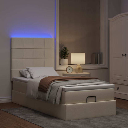 Ottoman bed met matras en LED's 90x200cm stof crèmekleurig
