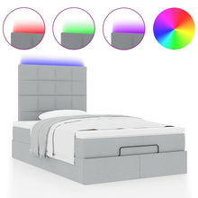 Ottoman bed met matras en LED's 120x200cm stof lichtgrijs