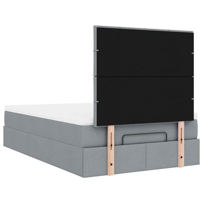 Ottoman bed met matras en LED's 120x200cm stof lichtgrijs