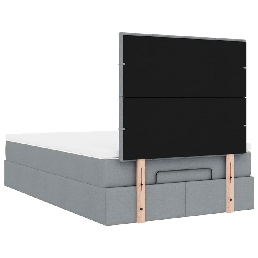 Ottoman bed met matras en LED's 120x200cm stof lichtgrijs