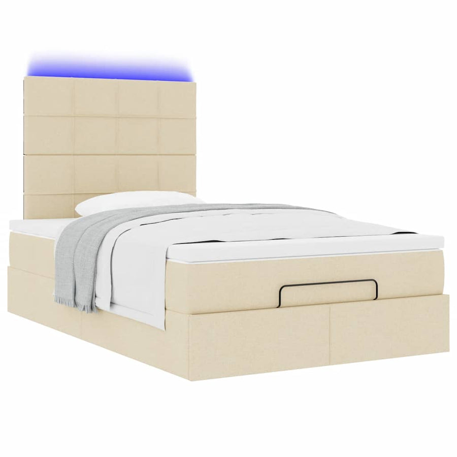 Ottoman bed met matras en LED's 120x200cm stof crèmekleurig