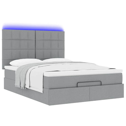 Ottoman bed met matras en LED's 140x190cm stof lichtgrijs