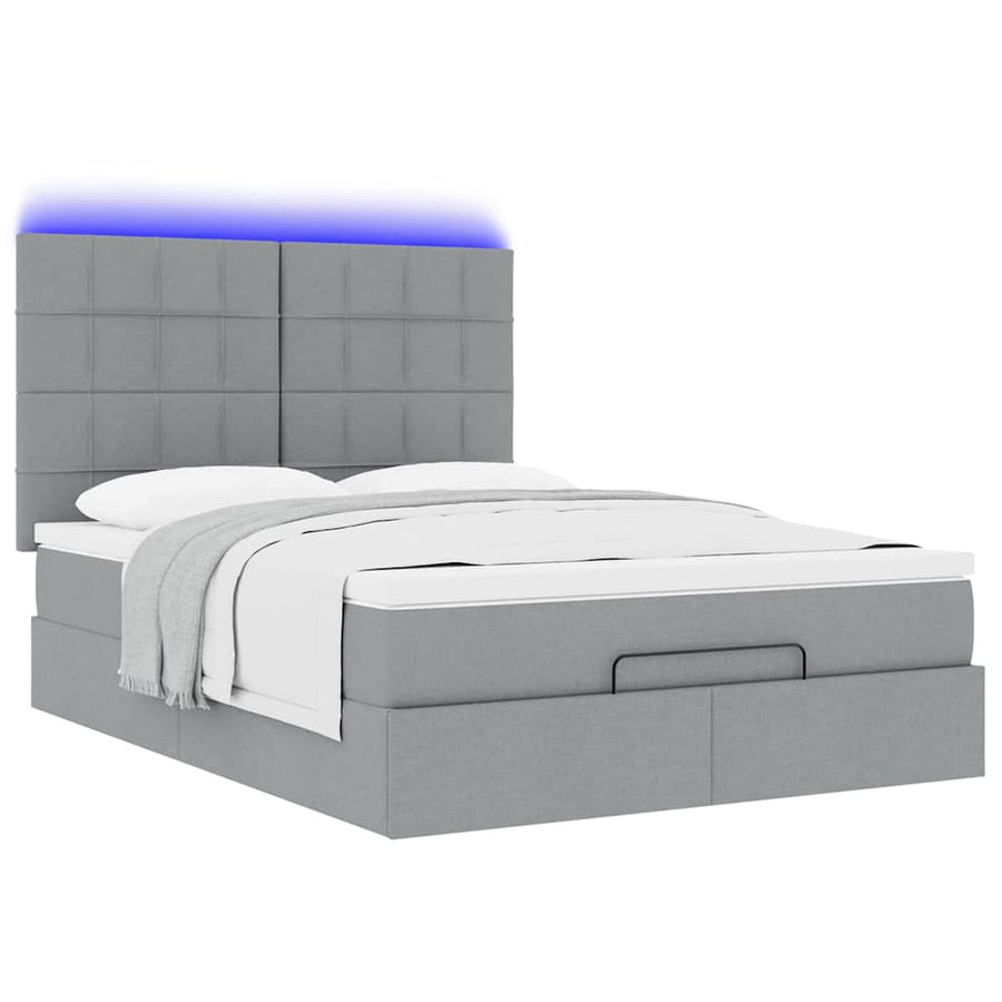 Ottoman bed met matras en LED's 140x190cm stof lichtgrijs