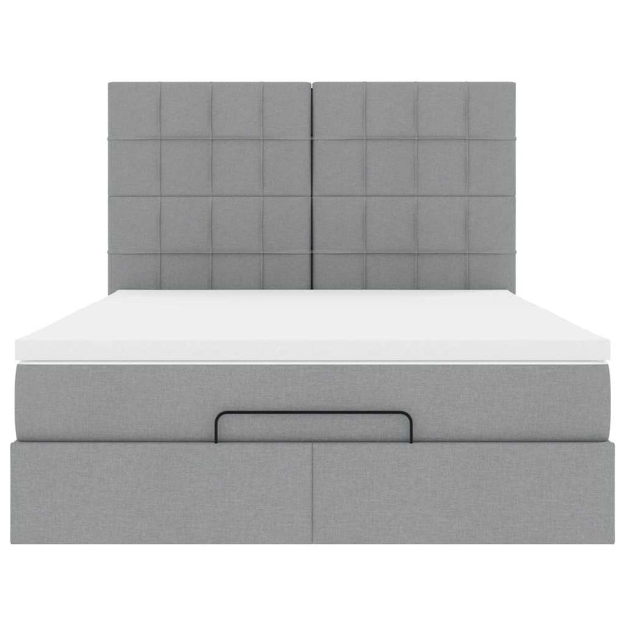 Ottoman bed met matras en LED's 140x190cm stof lichtgrijs