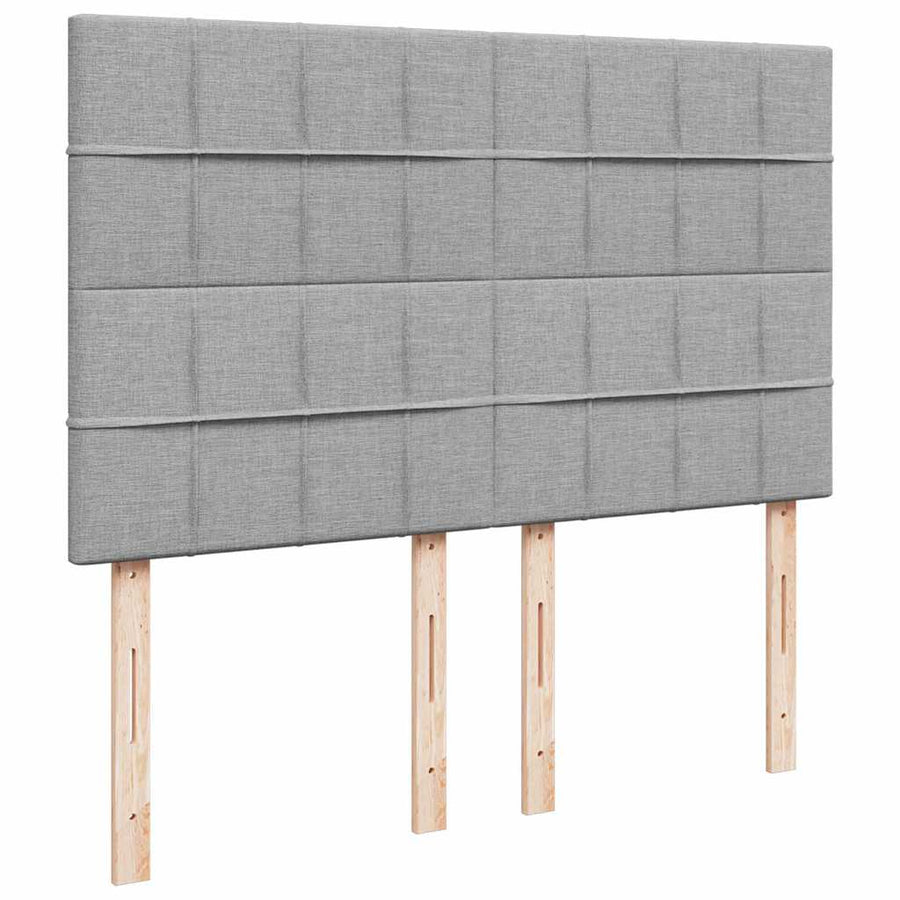 Ottoman bed met matras en LED's 140x190cm stof lichtgrijs