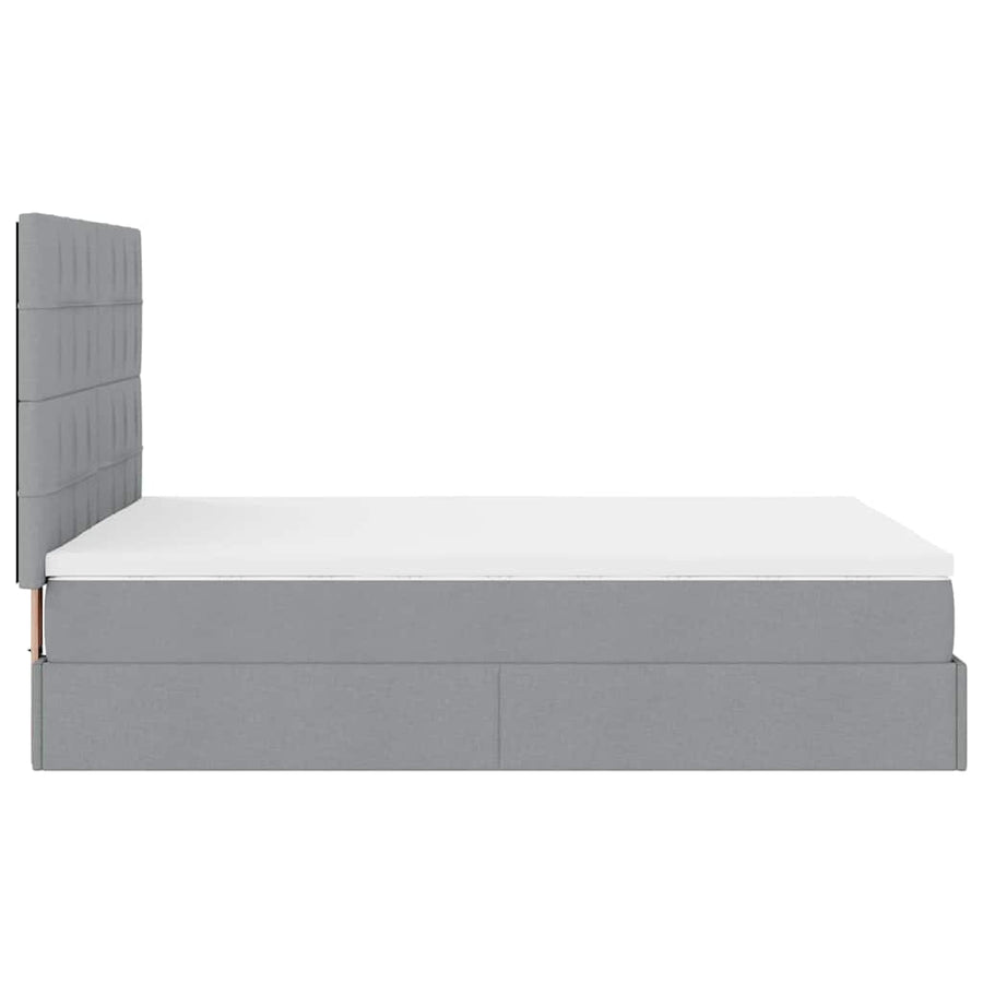 Ottoman bed met matras en LED's 140x190cm stof lichtgrijs